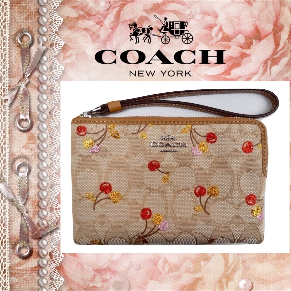 COACH ZIP WRISTLET IN SIGNATURE JACQUARD